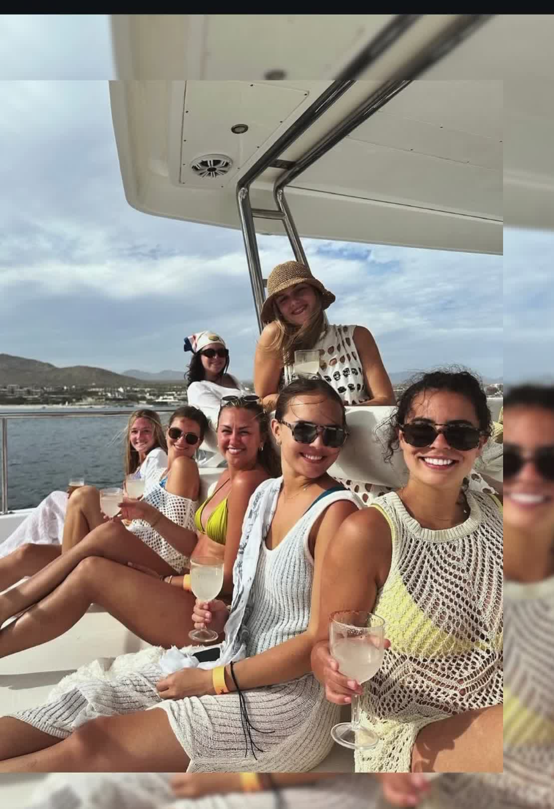 Friends toasting on a yacht in Cabo